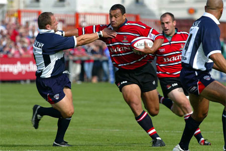 Zurich Premiership - Gloucester RFC v Bristol Shoguns @ Kingsholm, Gloucester - 21/9/2002 - Gloucester's  Junior Paramore (right) is tackled by Bristol's Neil McCarthy. ©2002 GPA Images E-mail: info@gpaimages.com www.gpaimages.com