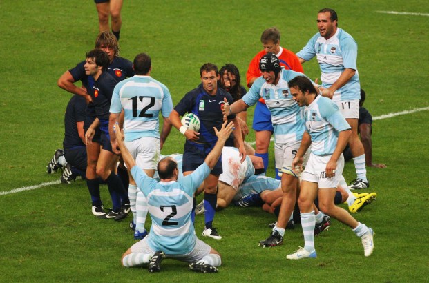 SAINT-DENIS, FRANCE - SEPTEMBER 07: Argentine players celebrate victory after the opening match of the Rugby World Cup 2007 between France and Argentina at the Stade de France on September 7, 2007 in Saint-Denis, France. (Photo by Stu Forster/Getty Images)